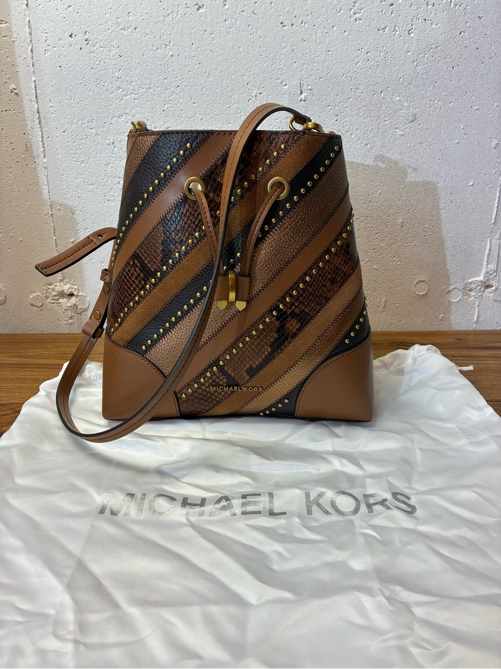 Michael Kors Tan and Black Leather Drawstring Bucket Bag with Stud Accents